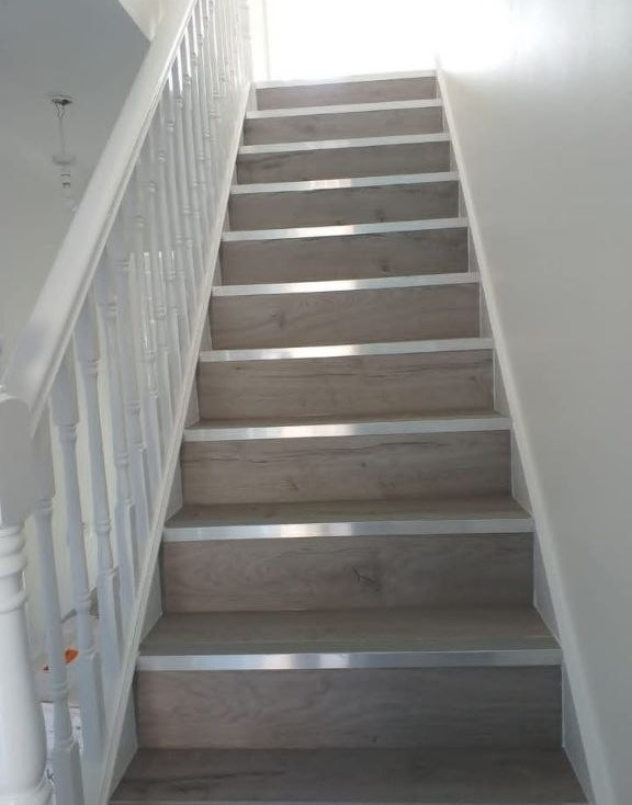Staircase and step cladding